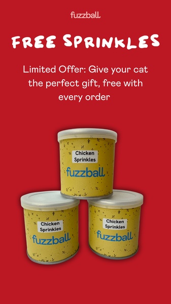 A high-contrast, minimalist promotional ad for cat treats featuring a bold 'Free' offer and a clear product stack.